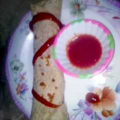 A picture of Cheesy vegetable roti roll.