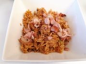 A picture of tomato and smoked beef rice