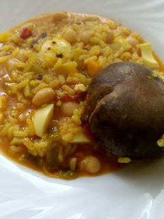 Una foto de Arroz caldoso con morcilla y alubias
