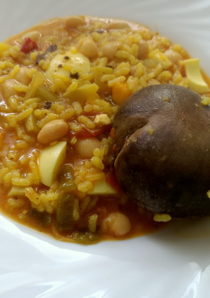 Una foto de Arroz caldoso con morcilla y alubias