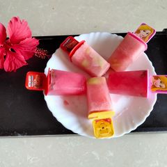 A picture of Watermelon and grapes,rose flavour and mint popsicles.