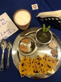 A picture of Sarson ka Saag and Makki ki Roti.