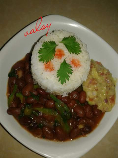 A picture of Rice /beans and guacamole.