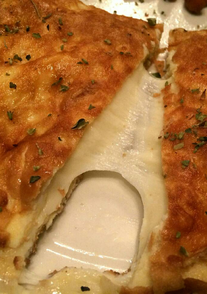 Una foto de Tortilla de provolone