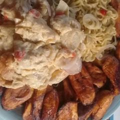 Indomine with Fried plantain,fried eggs A picture of Indomine with Fried plantain,fried eggs.