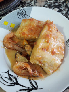 Una foto de Bacalao con marisco