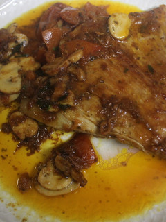Una foto de Secreto de cerdo con champiñones