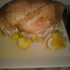A picture of Lady A's Stuffed Breast's Chicken With Yellow Squash.