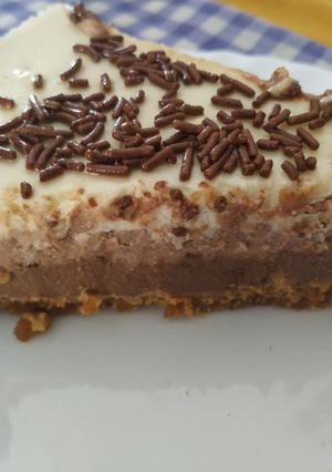 Una foto de Pastel tres chocolates (cuajada)