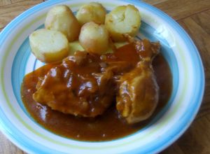 Una foto de Pollo encebollado en salsa de ketchup y coca cola