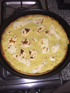 Una foto de Tarta de cebolla y queso