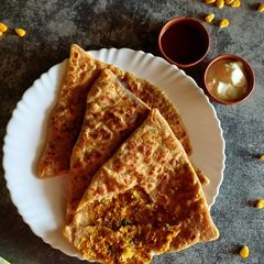 A picture of Corn_Paratha/corn_Stuffed_Flatbread.