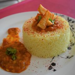 A picture of Tomato Dal Chaval Cook with Chef Phani.