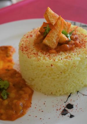 A picture of Tomato Dal Chaval Cook with Chef Phani.