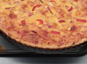 Una foto de Tarta de jamón y queso irresistible