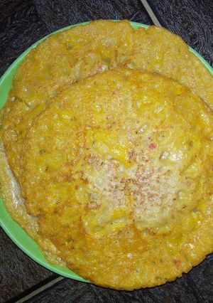 A picture of Kwalam na tabi/savoury pancake.