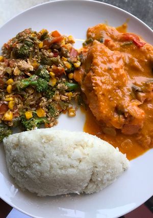 A picture of Ugali, Vegetable and Fish stew in milk.