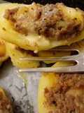 Patate ripiene con carne macinata e scamorza affumicata