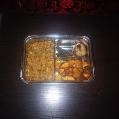 A picture of Porridge beans and diced plantain with fish.