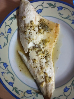 Una foto de Lubina al horno con vino blanco