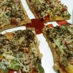 A picture of Delicious Capsicum Pizza.