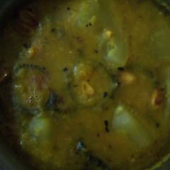 A picture of Moong daal with bitter gourd and bottle gourd.