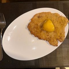A picture of Pork Schnitzel (optional spicy).