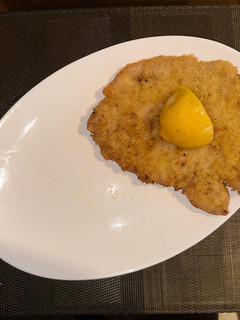 A picture of Pork Schnitzel (optional spicy).