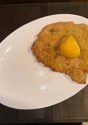 A picture of Pork Schnitzel (optional spicy).
