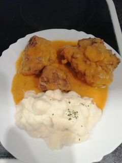 Una foto de Rabo de toro con Puré de patata