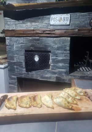 Una foto de Empanadas Vegetarianas al horno a leña