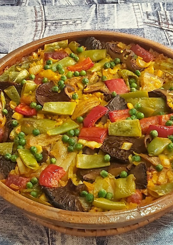 Una foto de Arroz con ibéricos y verdura al horno