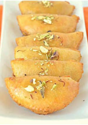 A picture of Rich & delicious, crispy & flaky traditional gujiya...