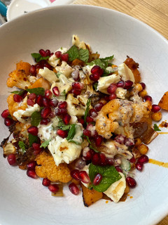 A picture of Harissa roasted squash and cauliflower salad.