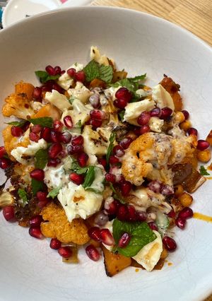 A picture of Harissa roasted squash and cauliflower salad.