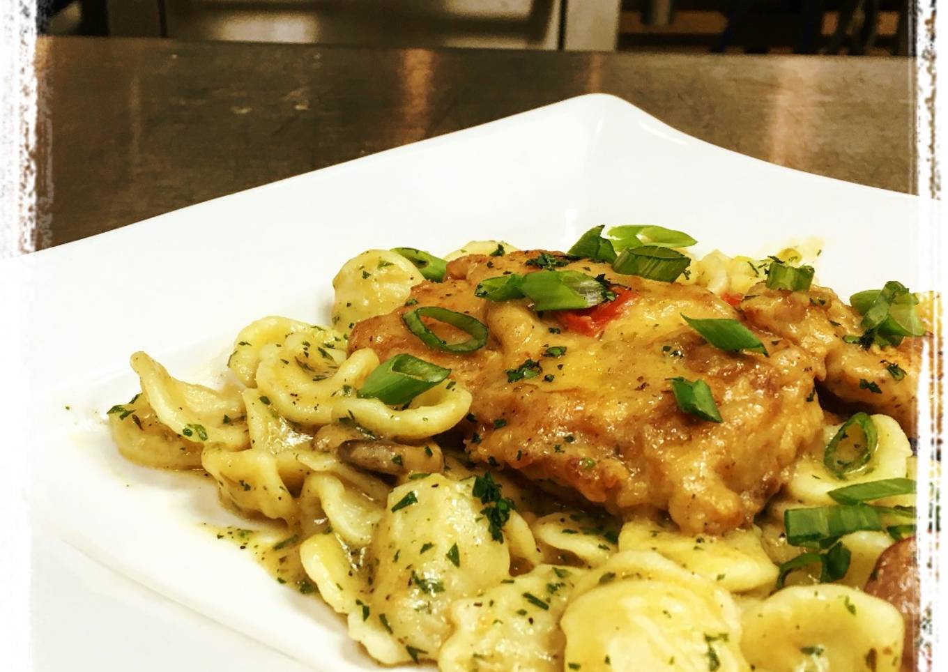 Braised Chicken,Â Andouille Mushroom Cream Sauce served over Orecchiette Pasta