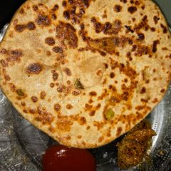 Mixed veg aloo parantha A picture of Mixed veg aloo parantha.