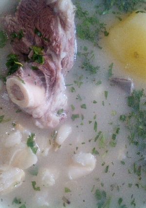 Una foto de Caldo de cordero con mote