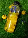 Infused water jeruk santang dan bunga telang