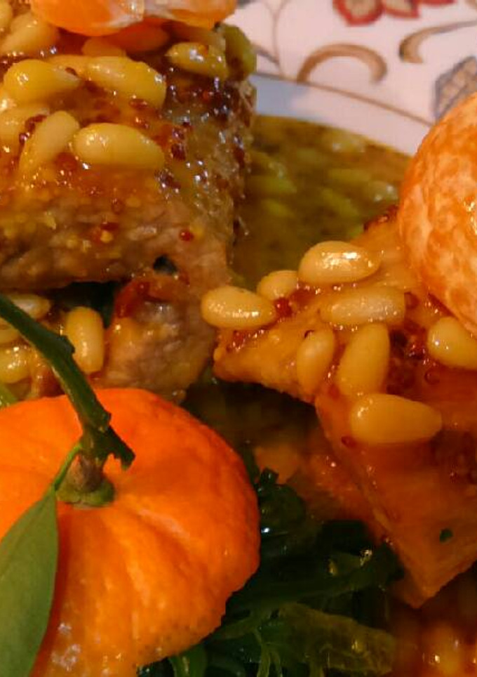 Una foto de Secreto iberico con salsa de mandarina!