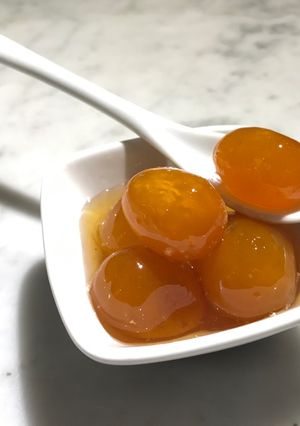 Una foto de Sin romper los kinotos!!!!(kumquat o kinotos en almíbar)