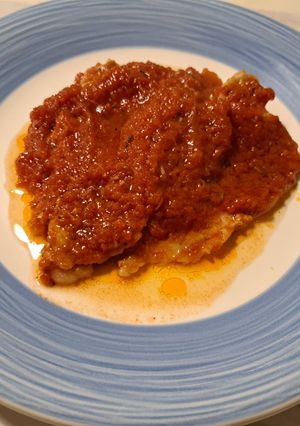 O poză a rețetei Carnita de Porc in Sos de Rosii.