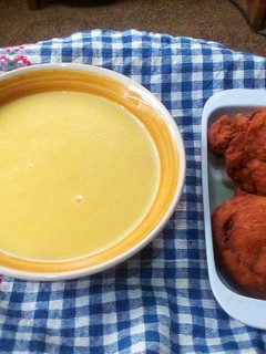 A picture of Akara and yellow pap.