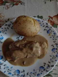 Una foto de Costilla de ternera con patata al vapor