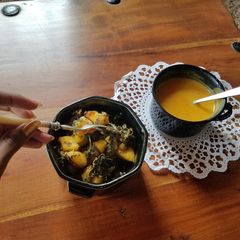 A picture of Butternut Soup served with Sauteed Sweet Potato.
