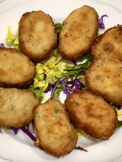 Una foto de Nuggets de pollo y espinacas