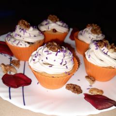 A picture of Coffee cream and walnut cupcakes.