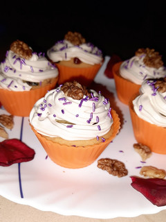 A picture of Coffee cream and walnut cupcakes.