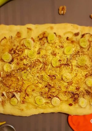 Une photo de Pizza poireau chèvre