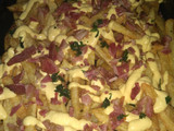 Papas fritas con salsa cheddar